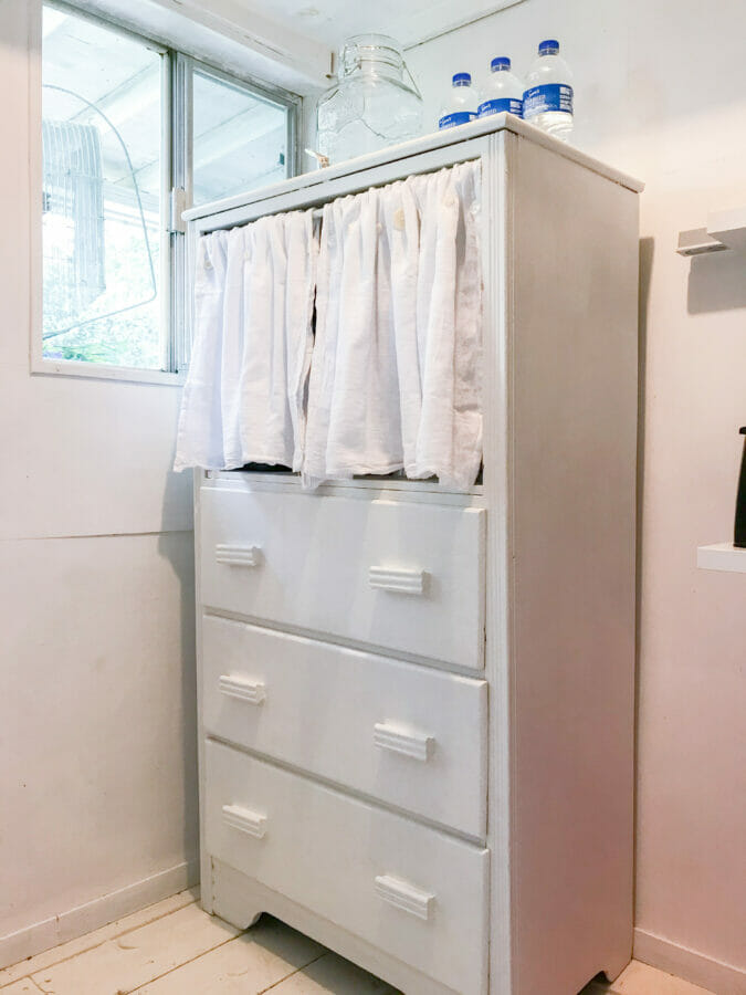 DIY white chest of drawers with curtain