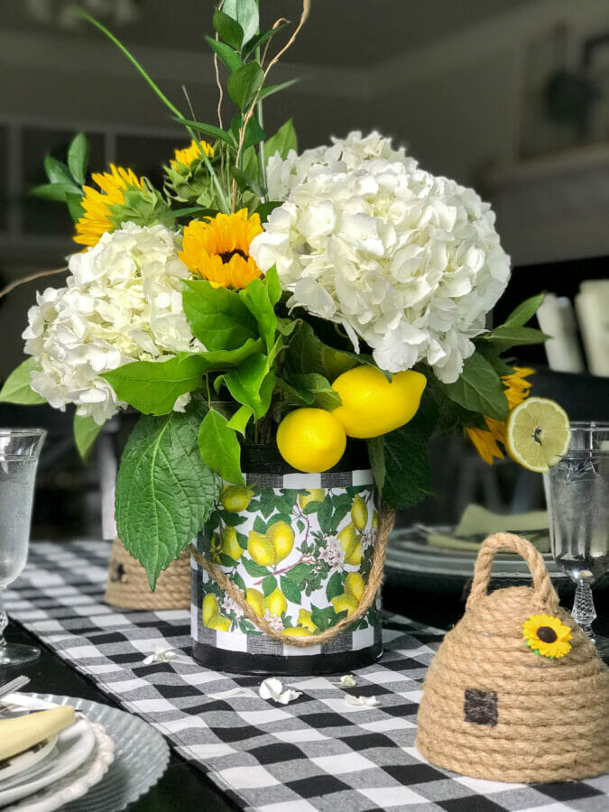 Lemony summer centerpiece with bee skep