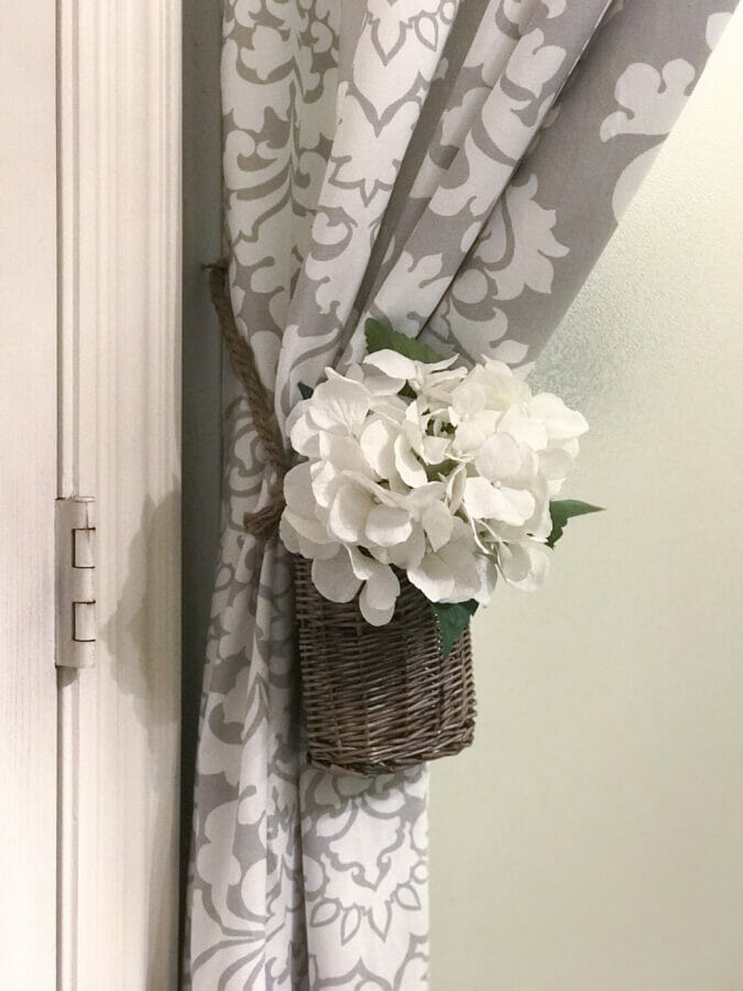 shower curtain tie back with basket and hydrangea