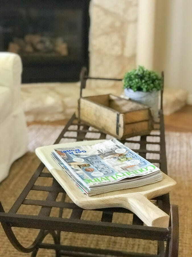 wood tray holding magazines