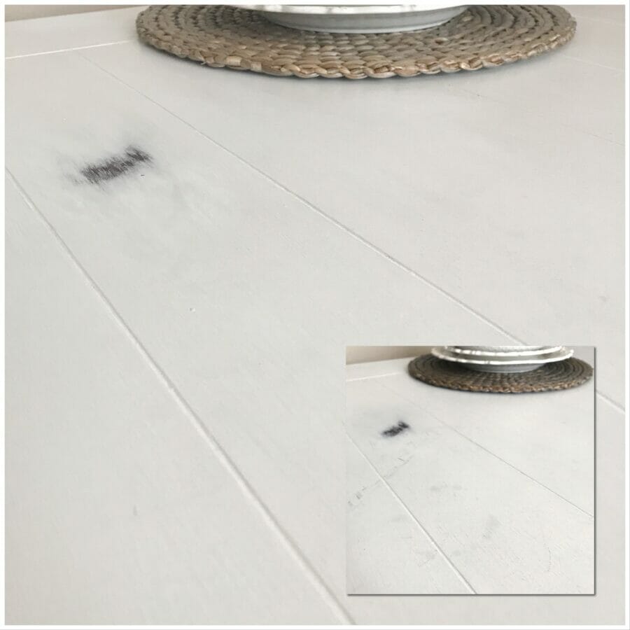After photo of scratches on table