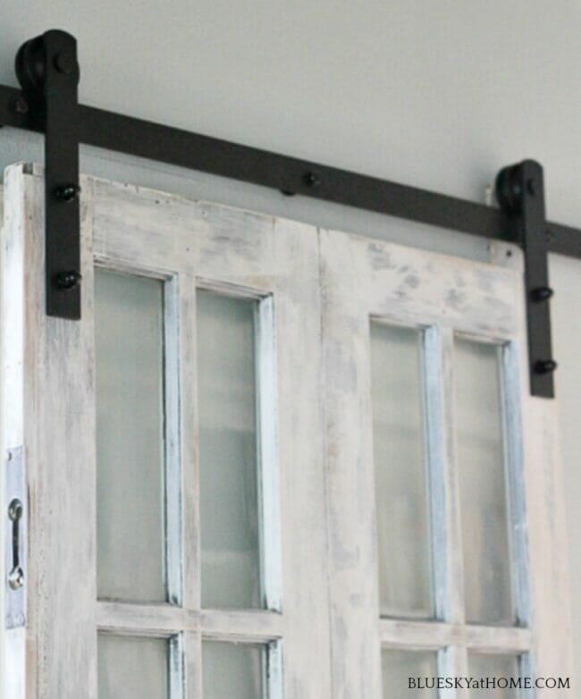 white barn door with clear panes
