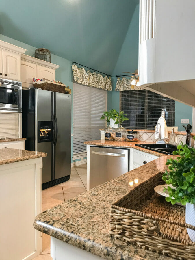 kitchen with drop zone and refrigerator