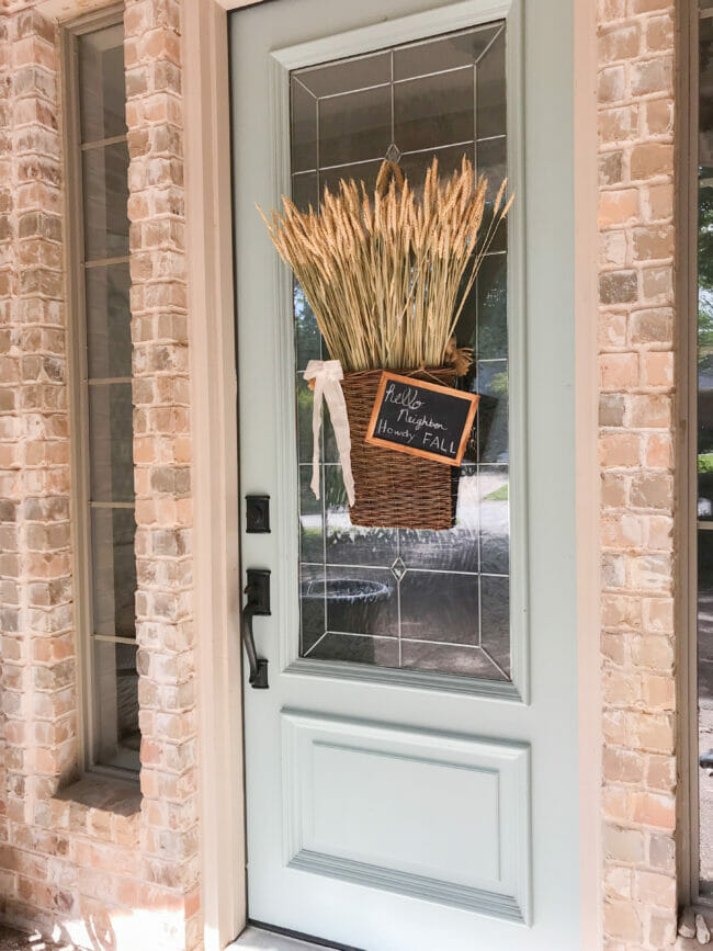 Full front door with fall hanging basket 