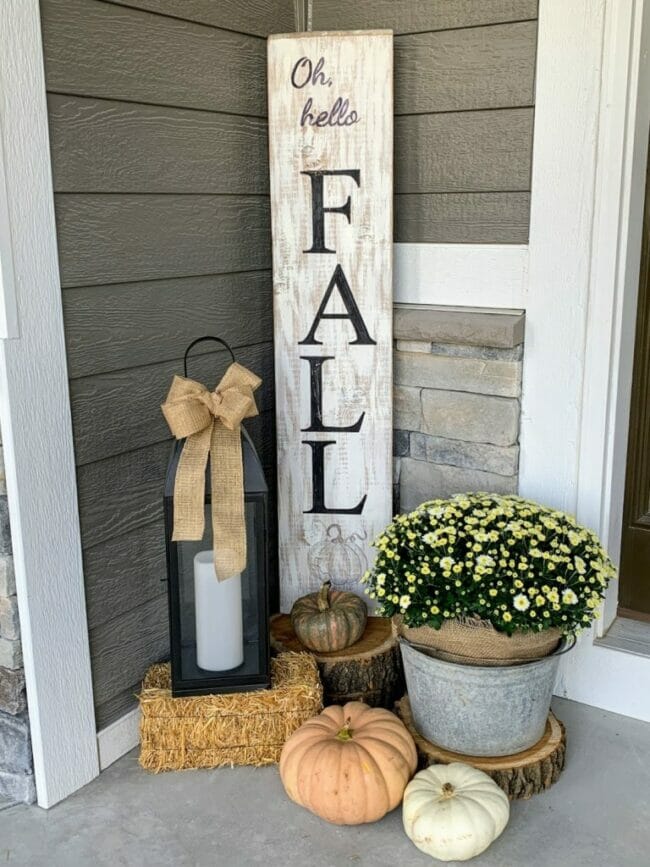 fall sign with mum and lanterns
