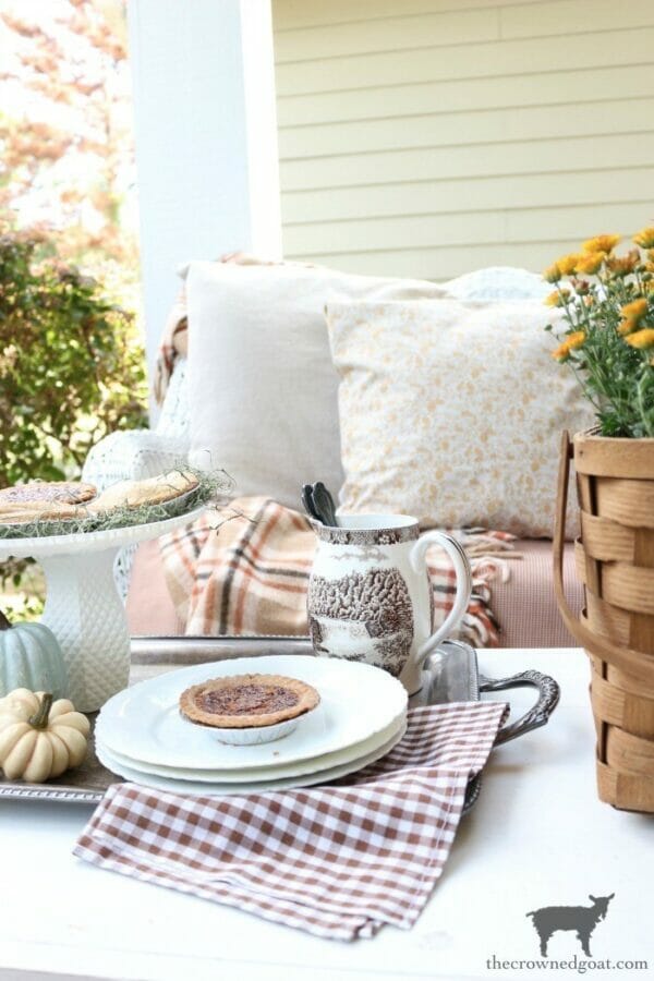 fall front porch with pie and pillows