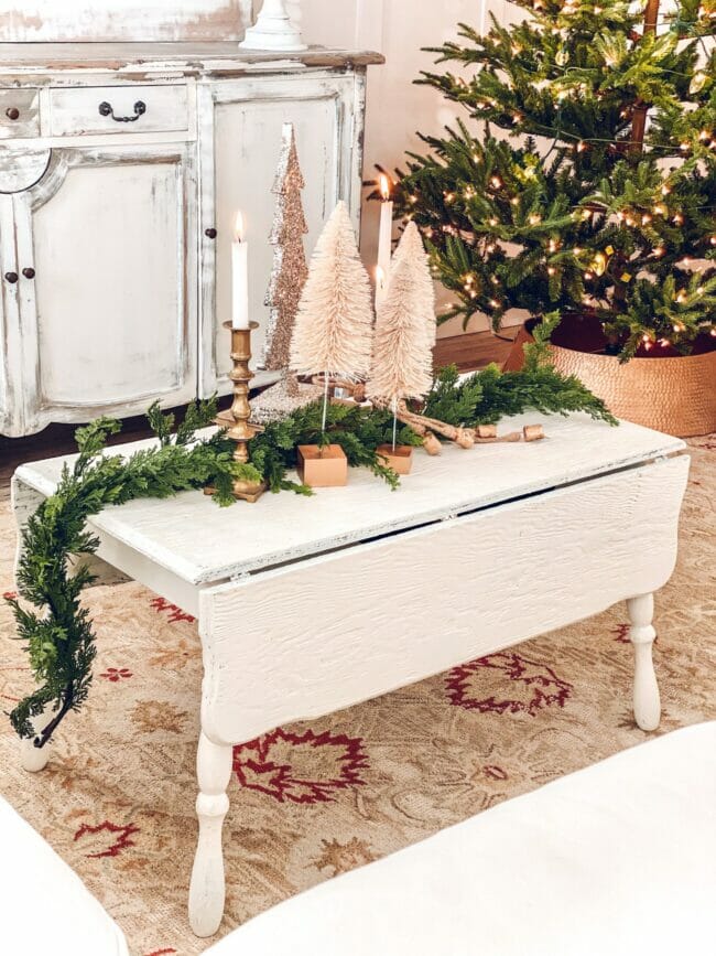 white coffee table with Christmas decor