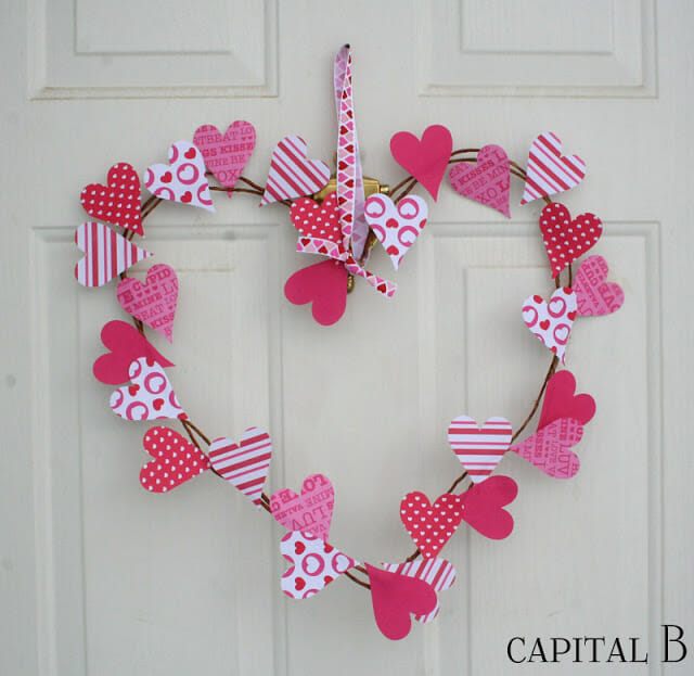 heart wreath hanging on white door