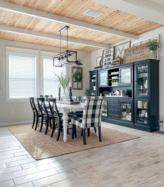 dining room with black cabinet and table