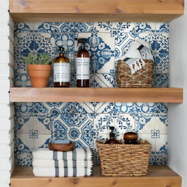 blue and white tile behind shelves