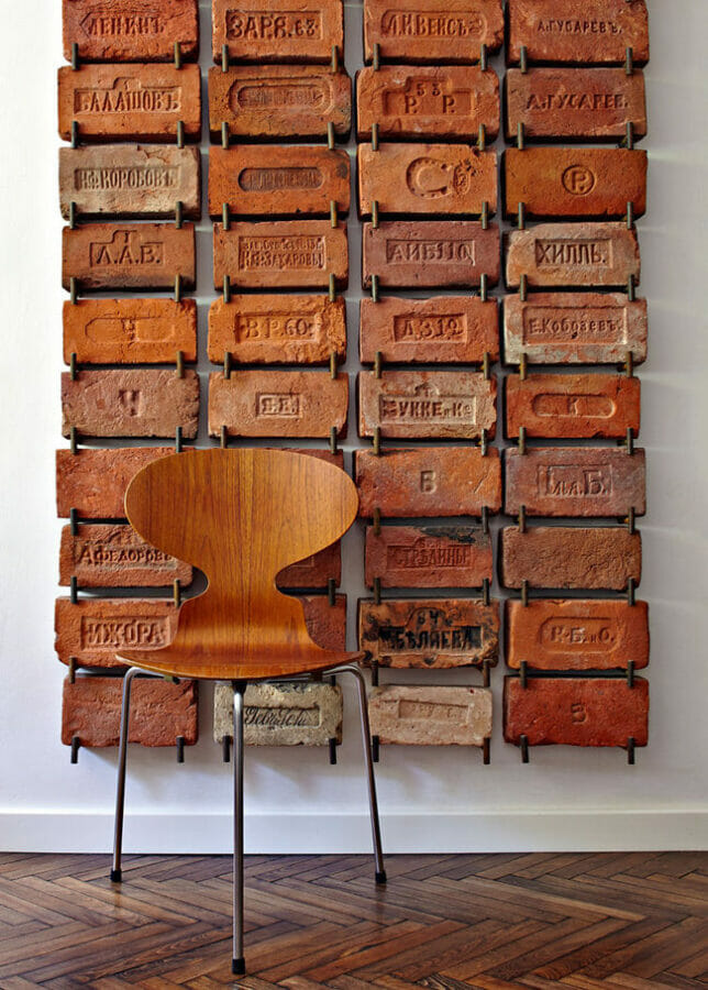 bricks as wall collage with wooden chair