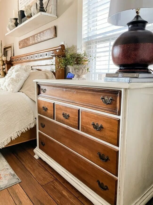 white and stained furniture piece in bedroom