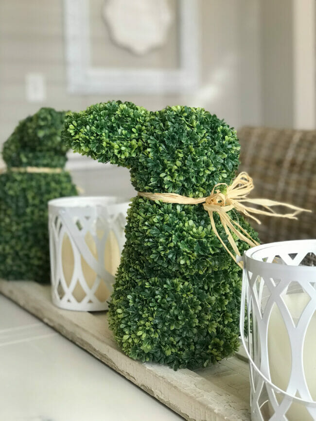 boxwood bunnies and white lanterns