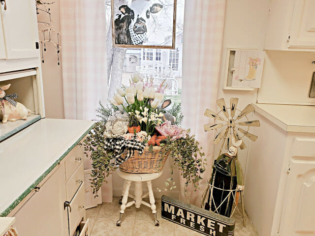 easter floral basket with cow print in window