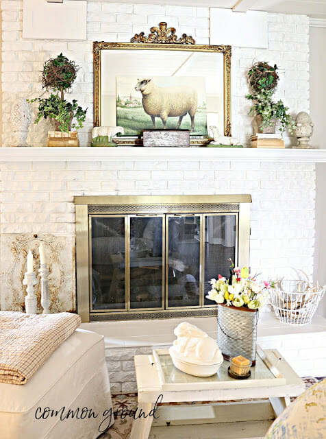 white mantel with lamb print