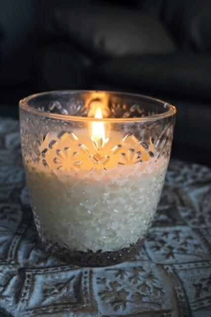 candle in glass jar