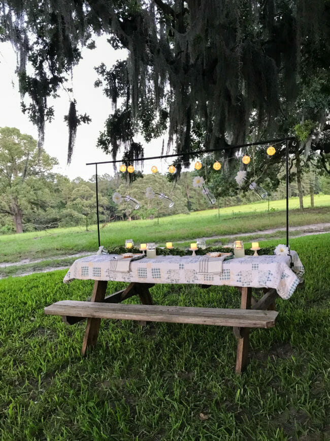 outdoor picnic table with quilt