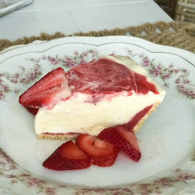 one slice of pie with extra strawberry's