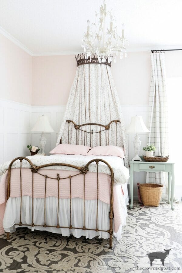 bedroom with crown headboard