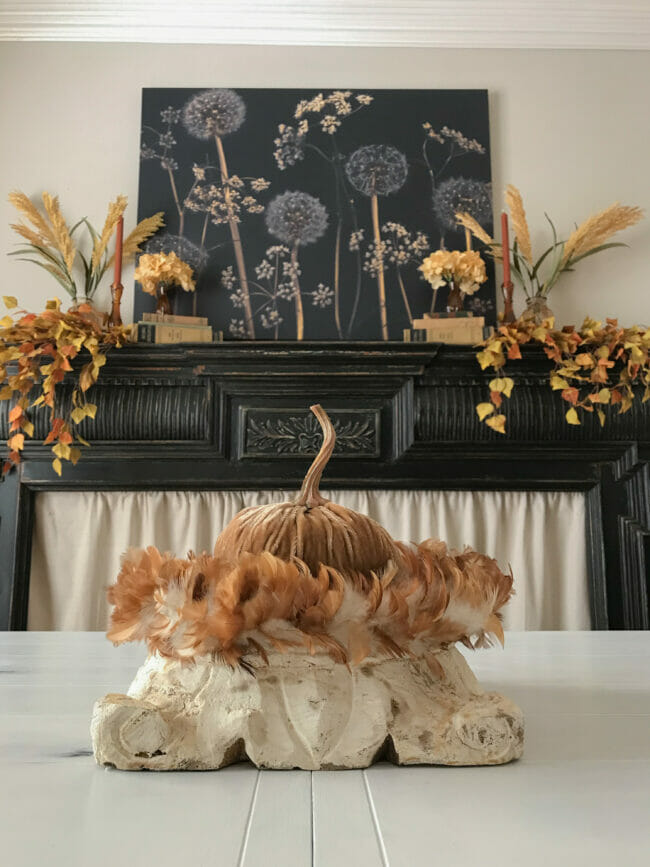 Autumn print over black mantel with fall decor