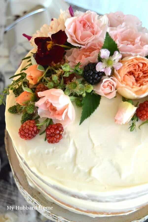 vanilla cake with flowers and fruit