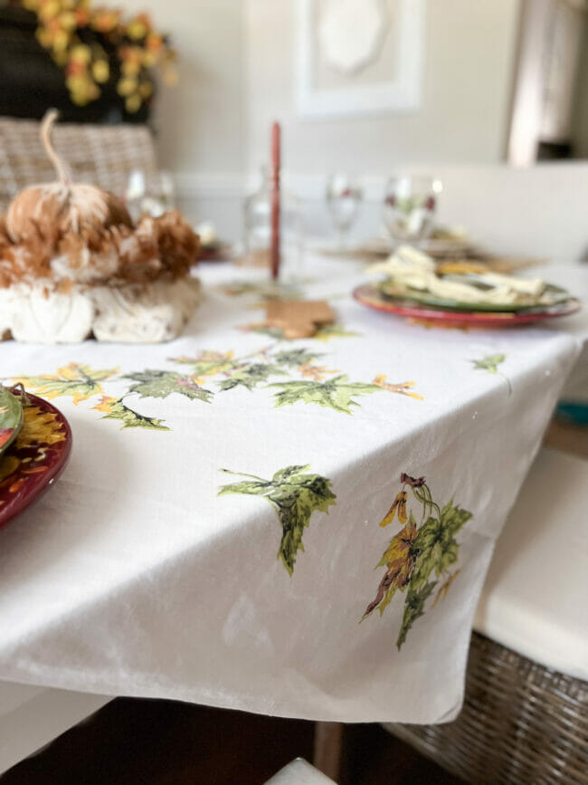vintage tablecloth with green and gold leaves
