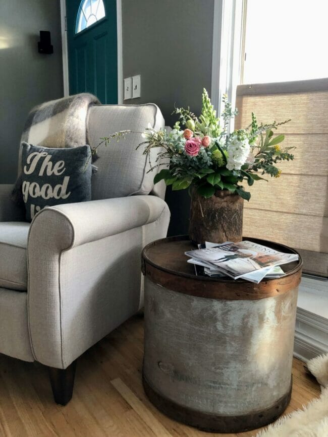 chair with table and flowers