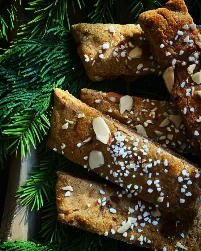 Cookies bars with sugar, almonds and greenery accents