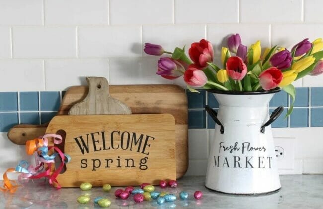 bread boards and white canister with spring flowers