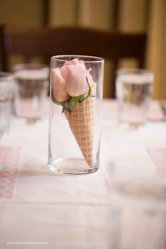 glass jar with ice cream cone and pink roses