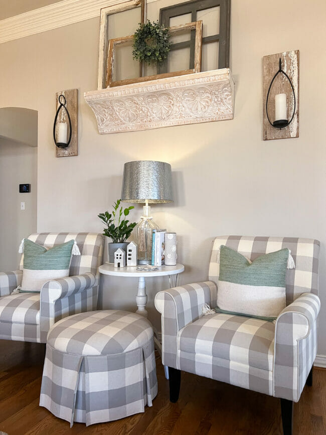 gray and white checked chairs with ottoman and side table