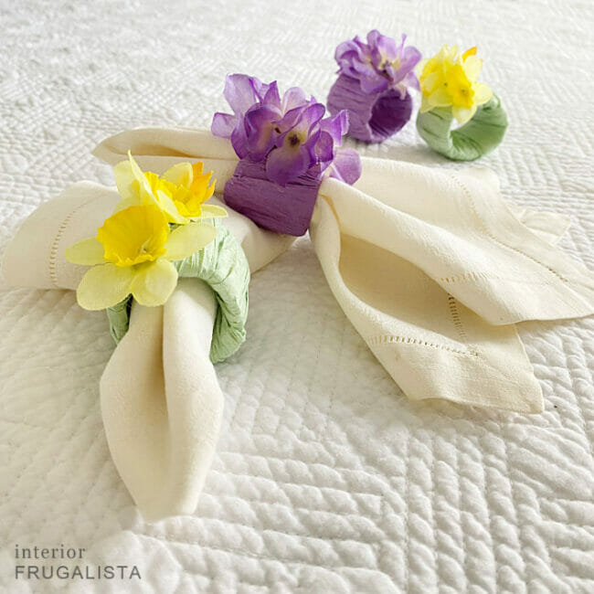 napkins with yellow nad purple flowery napkins rings