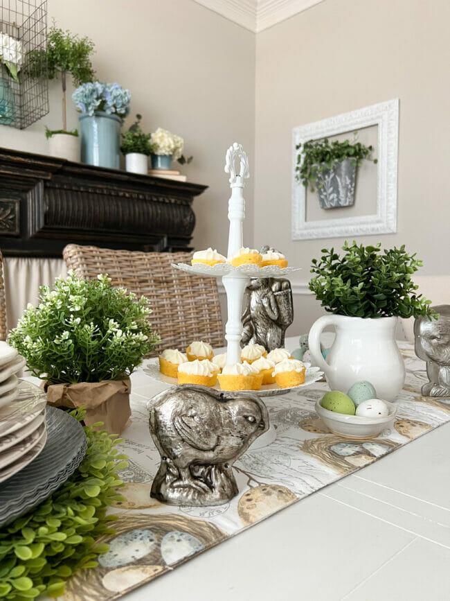 tiered tray with greenery and silver chick
