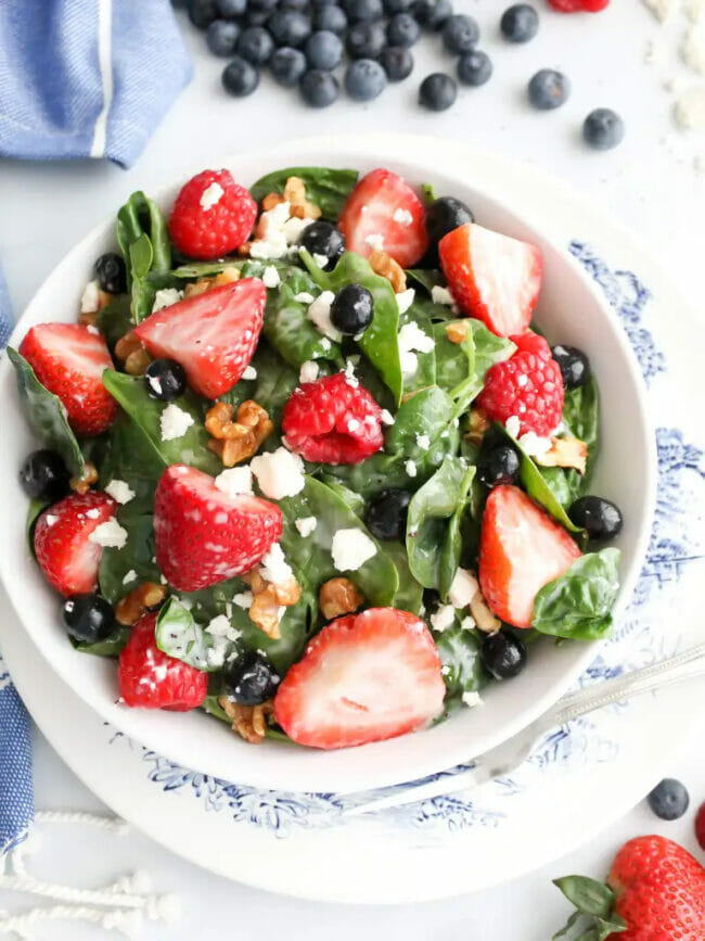 green salad with berries and nuts