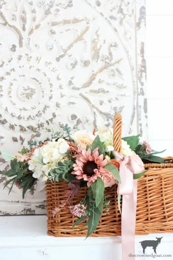 basket with pink sunflowers and ribbon