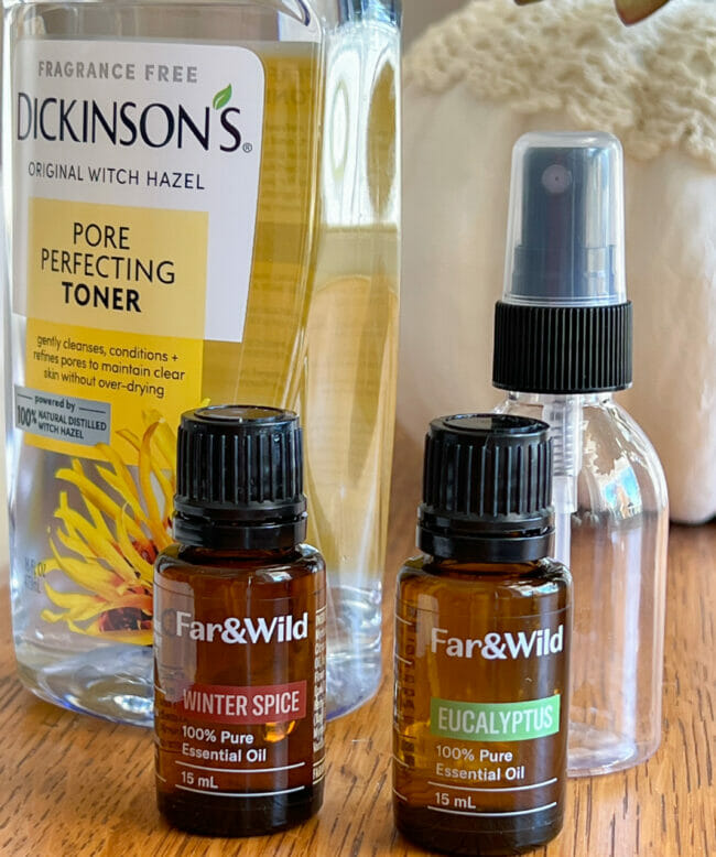 bottles of essential oils and spray bottle