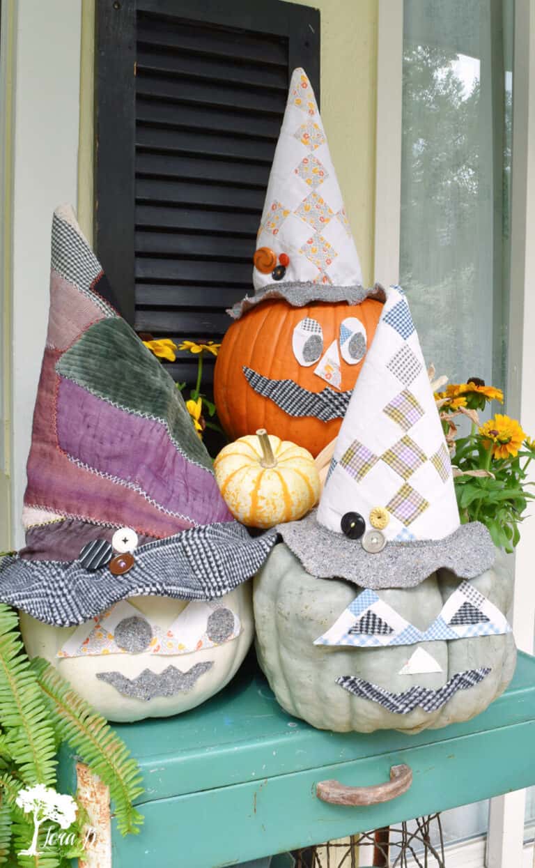 pumpkins with quilted with hats and faces