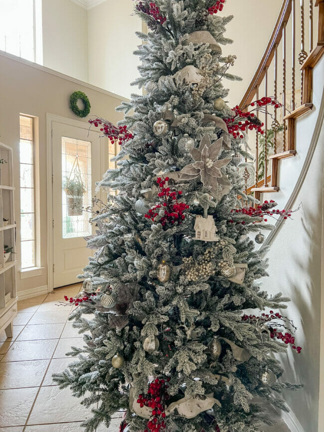 full flocked tree in entry