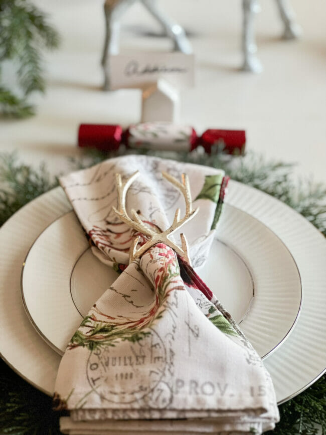 white dishes, Christmas napkin with silver antler napkin ring