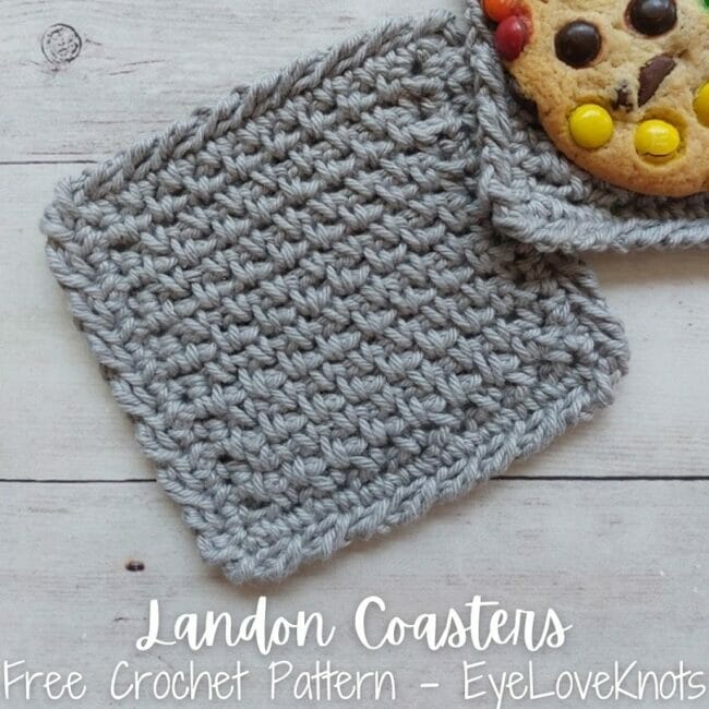 gray crocheted pot holder with cookie up in corner