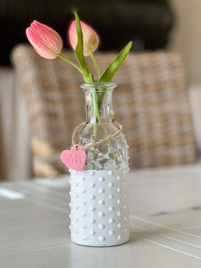 dipped knobby case with white paint and pink tulips
