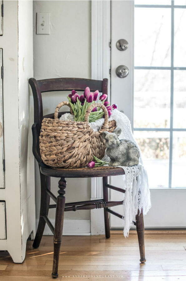 brown chair with basket and bunny