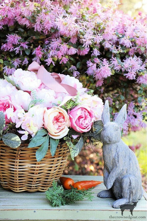 flowers in basket with gray bunny