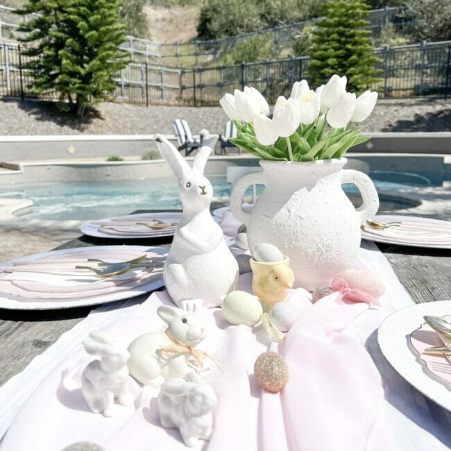 Outdoor Easter Table with white bunnies and white tulips