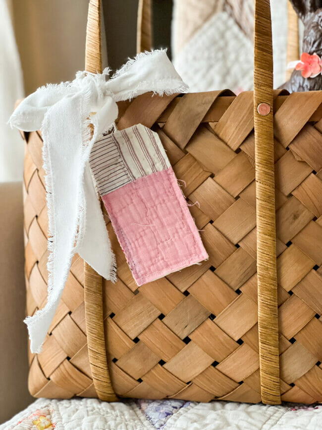 basket with white bow and quilted tag