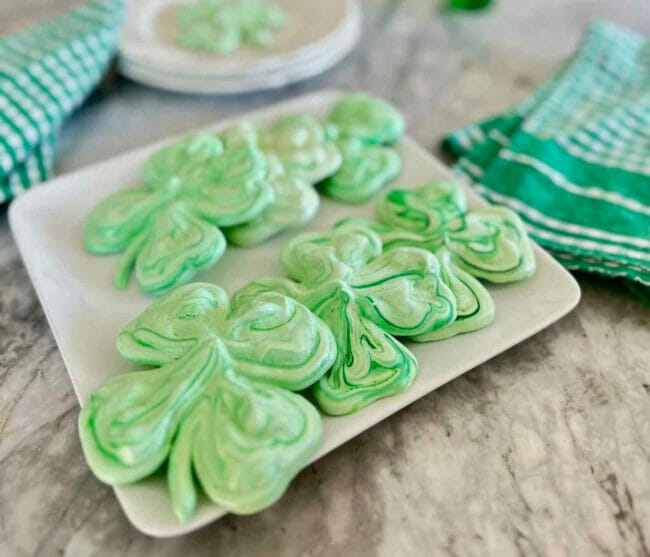 green shamrock cookies on platter