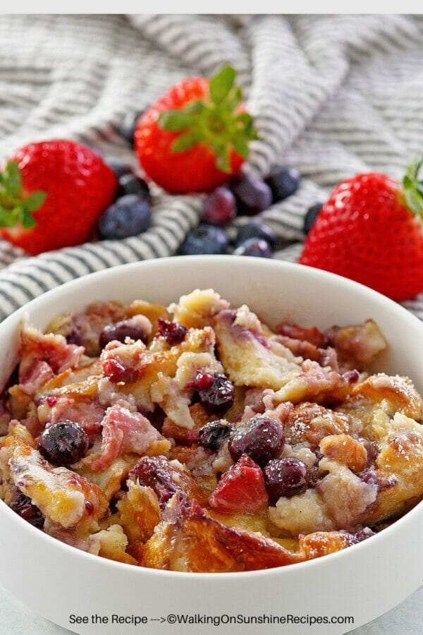 breakfast casserole with fruit in white bowl