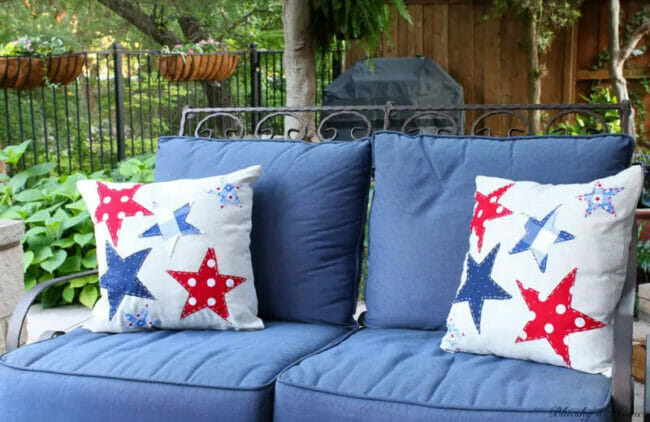 patriotic pillows on blue cushions