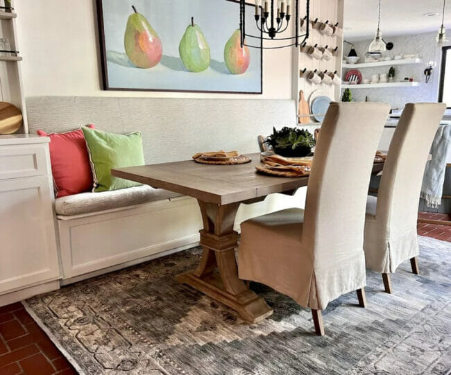 dining room with fruit print on wall