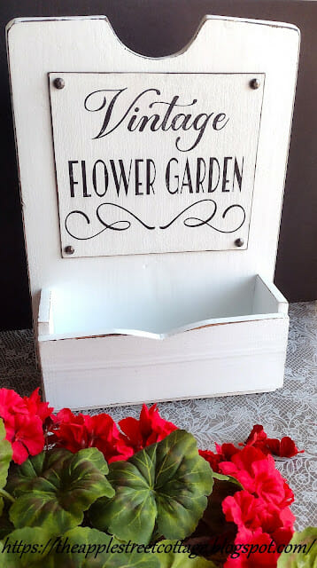 white wooden flower box